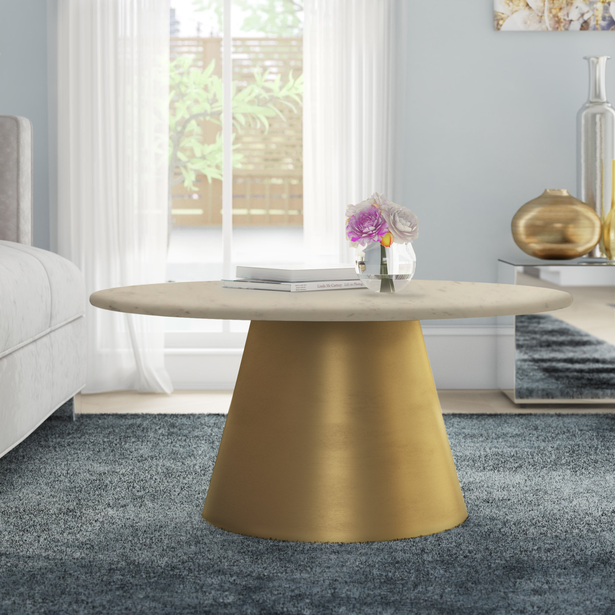 Gold pedestal coffee table discount